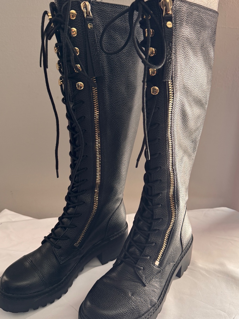 DKNY Black Lace-Up Knee Boots with Gold Zipper Accents